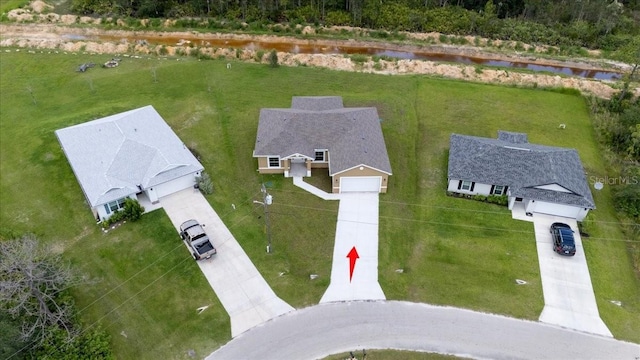 437 Mercedes Ct, Lehigh Acres, FL 33972 - aerial view of property and surrounding area with a large body of water