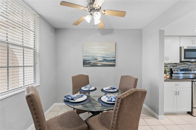 809 Russell Ln Unit 321, Brandon, FL 33510 - dining area with light tile patterned flooring, plenty of natural light, and a ceiling fan