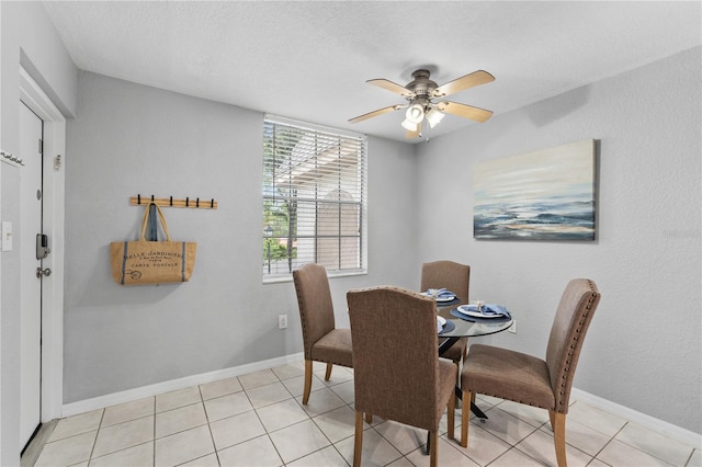 809 Russell Ln Unit 321, Brandon, FL 33510 - dining room with a ceiling fan, light tile patterned floors, and a textured ceiling