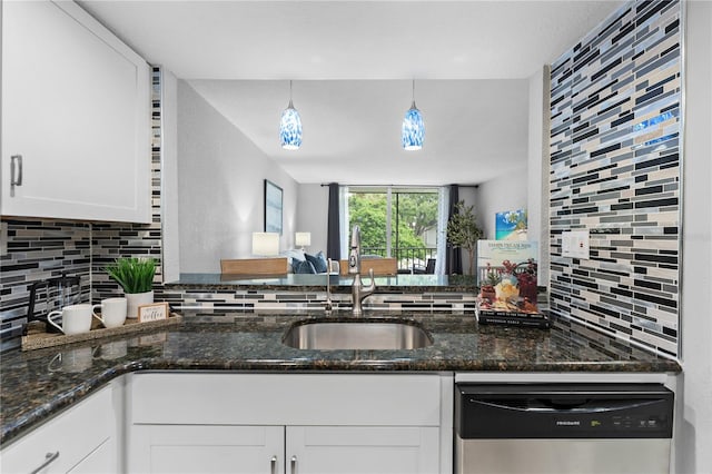809 Russell Ln Unit 321, Brandon, FL 33510 - kitchen featuring stainless steel dishwasher, backsplash, white cabinetry, and dark stone counters
