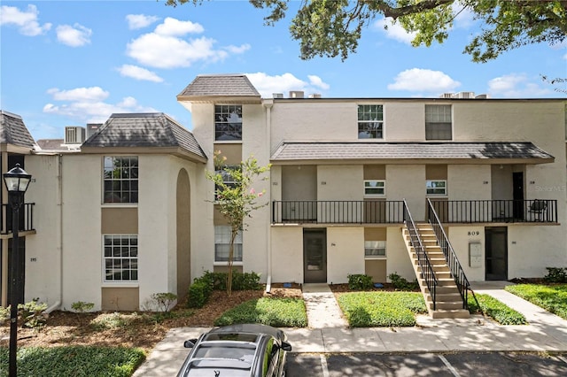 809 Russell Ln Unit 321, Brandon, FL 33510 - view of building exterior with stairs