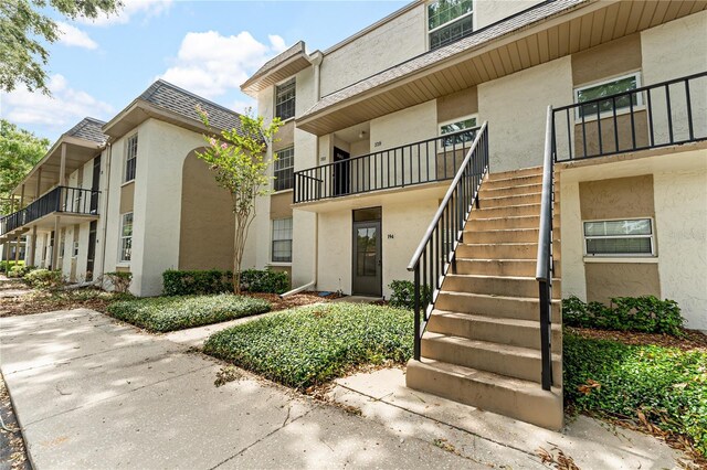 809 Russell Ln Unit 321, Brandon, FL 33510 - view of property featuring stairs