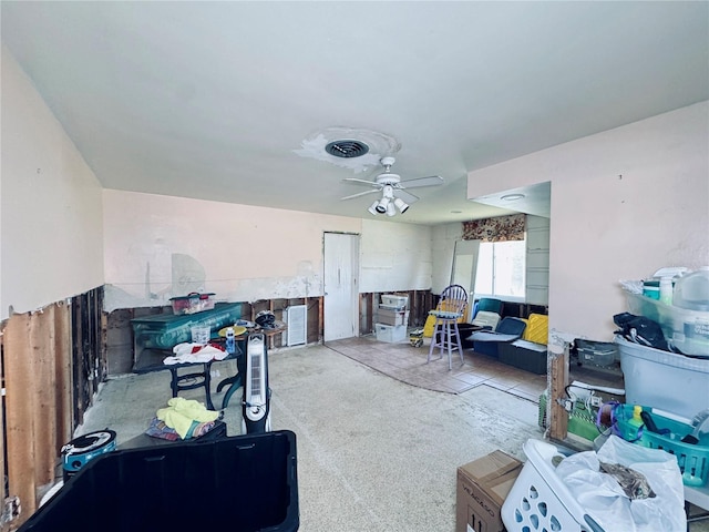 5116 Venetian Blvd NE, Saint Petersburg, FL 33703 - living room featuring carpet flooring and a ceiling fan
