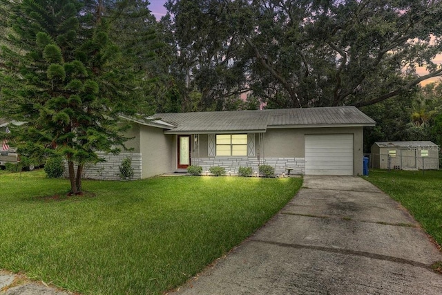320 Pheasant Cir, Brandon, FL 33510 - single story home with stucco siding, a garage, and concrete driveway