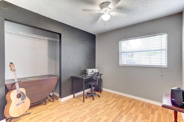 320 Pheasant Cir, Brandon, FL 33510 - office space with wood finished floors, a textured ceiling, and ceiling fan