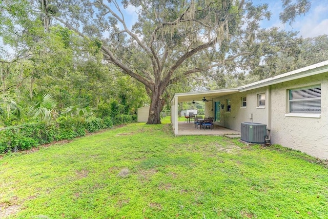320 Pheasant Cir, Brandon, FL 33510 - view of grassy yard with a patio area and a ceiling fan