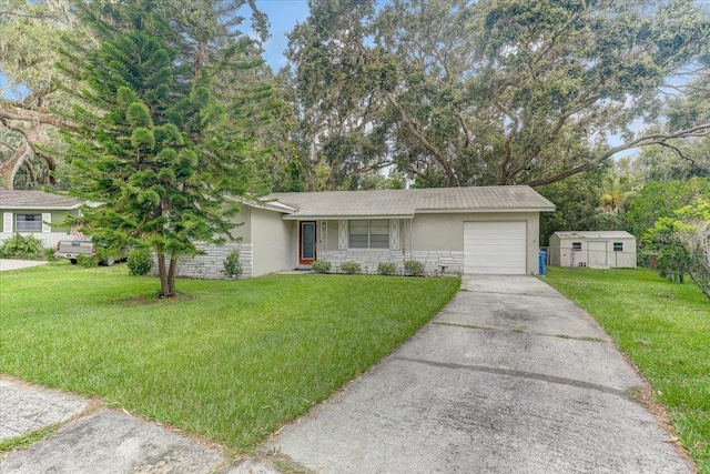320 Pheasant Cir, Brandon, FL 33510 - ranch-style house featuring stucco siding, an attached garage, driveway, and a front yard