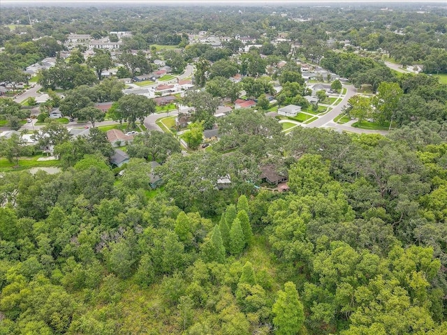 320 Pheasant Cir, Brandon, FL 33510 - aerial overview of property's location with a heavily wooded area