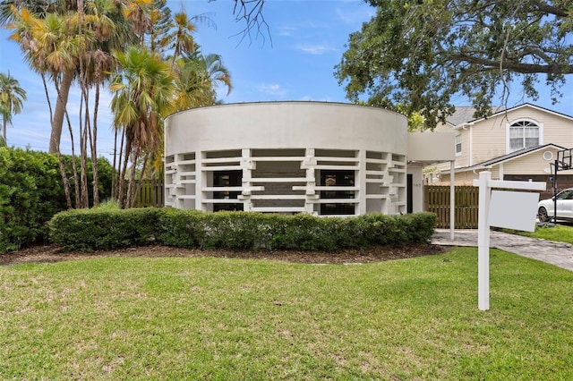 163 Barbados Ave, Tampa, FL 33606 - art deco inspired home with concrete driveway and stucco siding