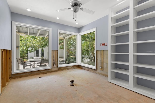 163 Barbados Ave, Tampa, FL 33606 - unfurnished room with concrete flooring, plenty of natural light, a ceiling fan, and recessed lighting