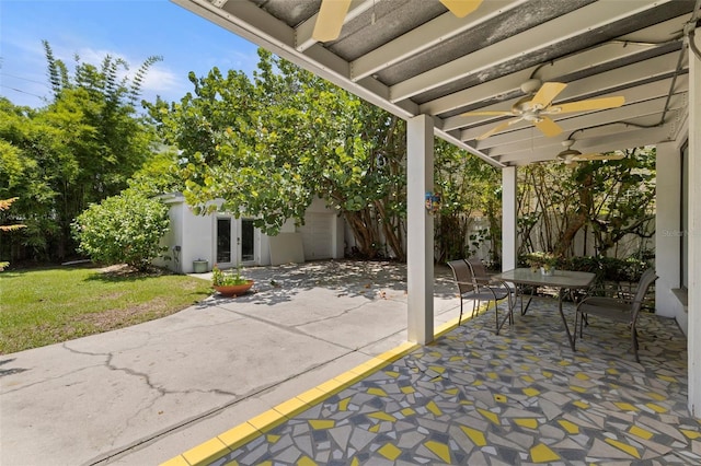 163 Barbados Ave, Tampa, FL 33606 - view of patio featuring a ceiling fan, french doors, outdoor dining space, and an outdoor structure
