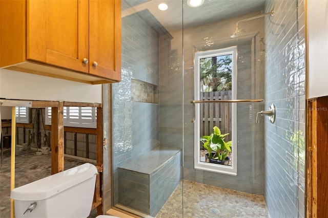 163 Barbados Ave, Tampa, FL 33606 - bathroom featuring a stall shower and toilet