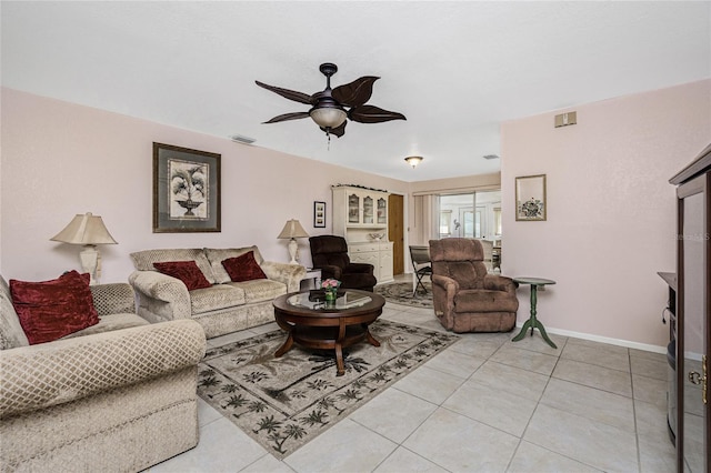 11596 SW Lemon Ave, Arcadia, FL 34269 - living room with a ceiling fan and light tile patterned floors