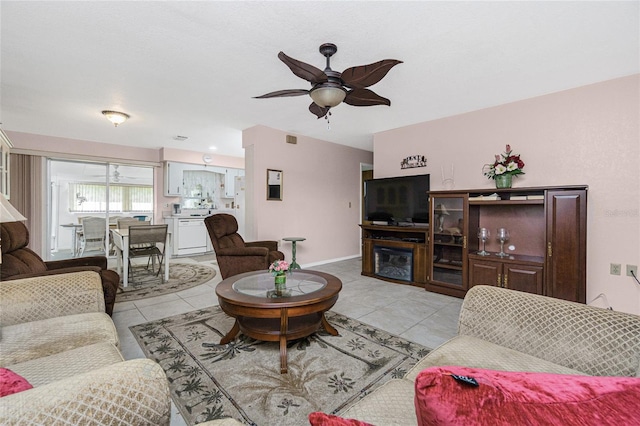11596 SW Lemon Ave, Arcadia, FL 34269 - living room with ceiling fan and light tile patterned floors