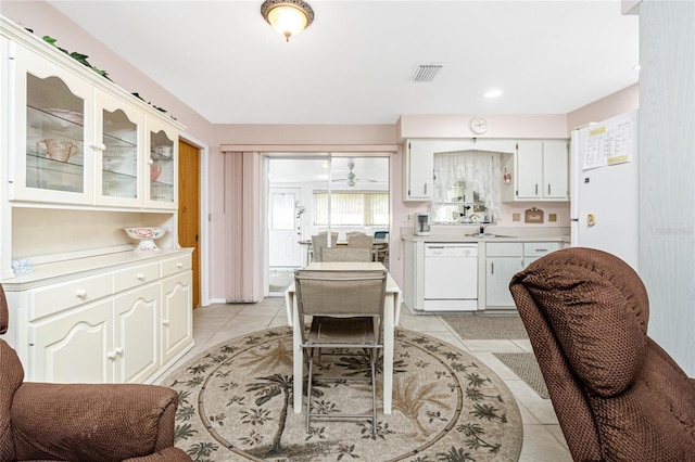 11596 SW Lemon Ave, Arcadia, FL 34269 - dining room with light tile patterned flooring and recessed lighting