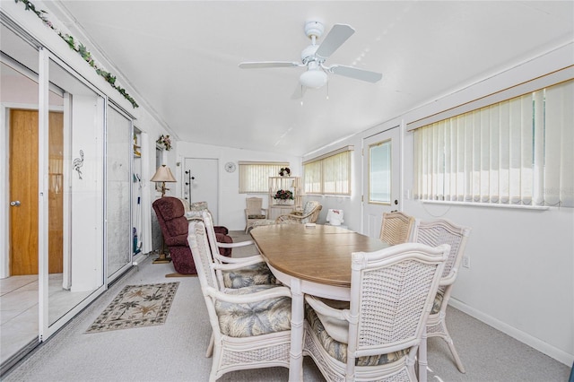 11596 SW Lemon Ave, Arcadia, FL 34269 - carpeted dining area with a ceiling fan and vaulted ceiling