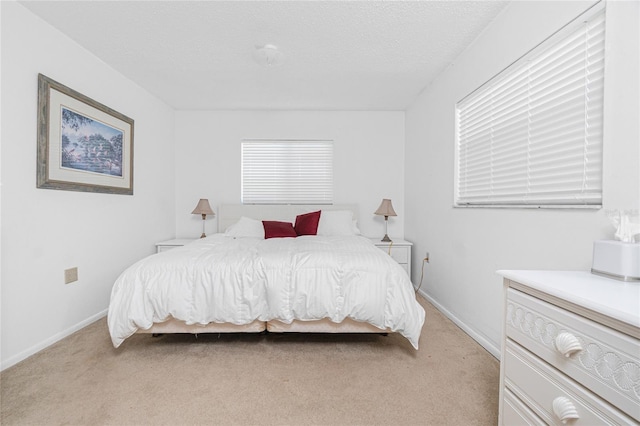 11596 SW Lemon Ave, Arcadia, FL 34269 - bedroom with light colored carpet and baseboards