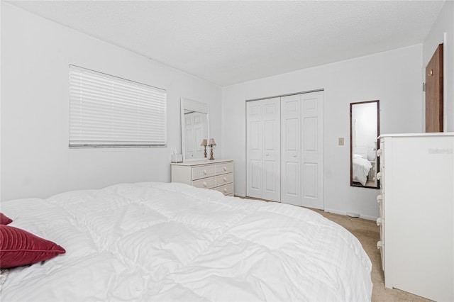 11596 SW Lemon Ave, Arcadia, FL 34269 - bedroom with a closet, light colored carpet, and a textured ceiling