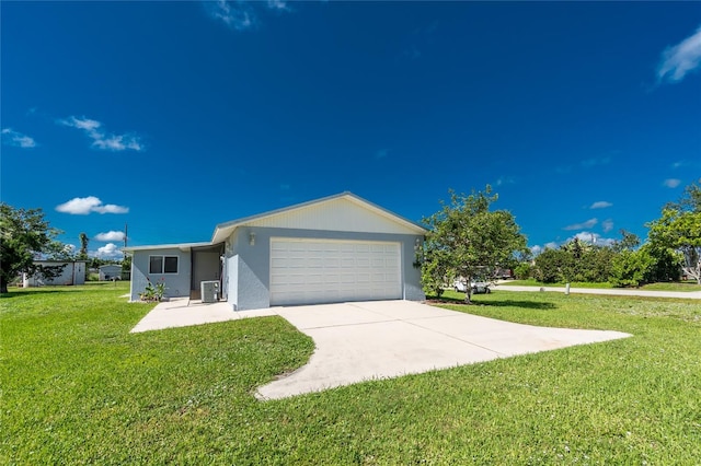 11596 SW Lemon Ave, Arcadia, FL 34269 - view of front of property with an attached garage, a front lawn, and driveway