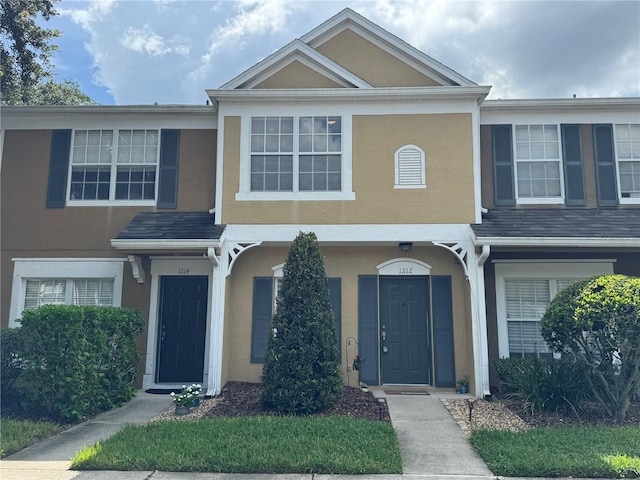 1212 Kennewick Ct, Wesley Chapel, FL 33543 - view of property with stucco siding