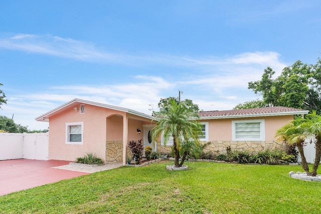217 Bryan Rd, Brandon, FL 33511 - ranch-style house featuring stone siding and stucco siding