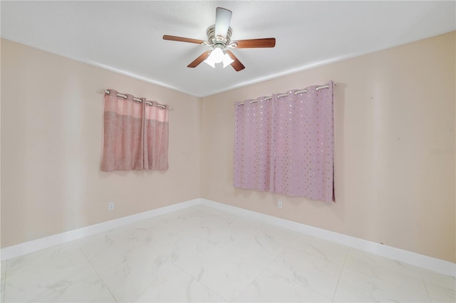 217 Bryan Rd, Brandon, FL 33511 - unfurnished room featuring ceiling fan and marble look tile flooring