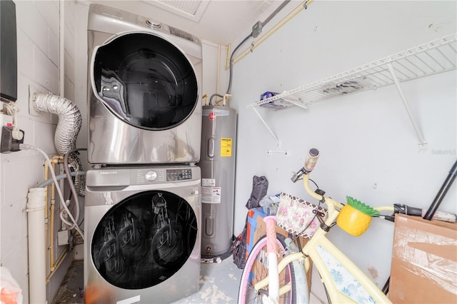 217 Bryan Rd, Brandon, FL 33511 - laundry area with estacked washer and dryer and water heater