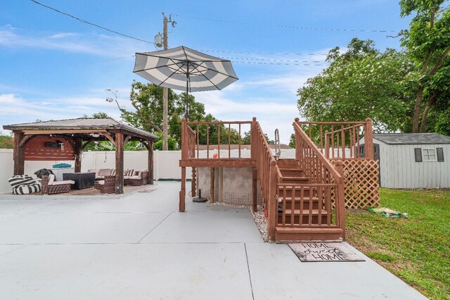 217 Bryan Rd, Brandon, FL 33511 - view of patio featuring an outdoor living space, a gazebo, stairs, and a shed