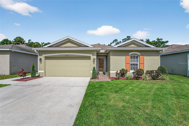 10409 Candleberry Woods Ln, Gibsonton, FL 33534 - single story home featuring stucco siding, an attached garage, concrete driveway, and a front yard