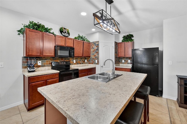 10409 Candleberry Woods Ln, Gibsonton, FL 33534 - kitchen featuring black appliances, backsplash, light tile patterned floors, light countertops, and recessed lighting