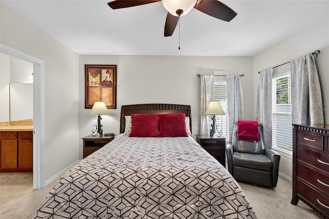 10409 Candleberry Woods Ln, Gibsonton, FL 33534 - bedroom featuring ceiling fan and connected bathroom