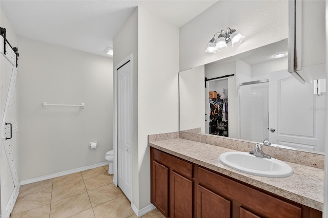 10409 Candleberry Woods Ln, Gibsonton, FL 33534 - full bathroom with vanity, a spacious closet, tile patterned flooring, and a shower stall
