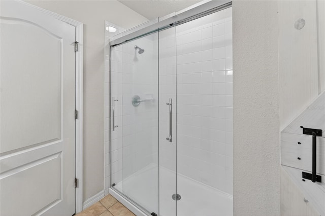10409 Candleberry Woods Ln, Gibsonton, FL 33534 - full bath with a shower stall and tile patterned flooring