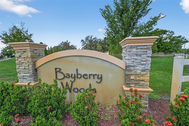 10409 Candleberry Woods Ln, Gibsonton, FL 33534 - community sign featuring a yard