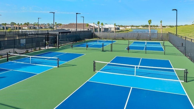 4704 Isonzo Way, Wesley Chapel, FL 33543 - view of tennis court with a residential view and community basketball court