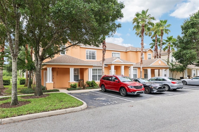 1713 Retreat Cir, Clermont, FL 34714 - multi unit property featuring uncovered parking and stucco siding