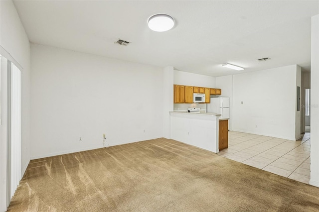 1713 Retreat Cir, Clermont, FL 34714 - unfurnished living room featuring light colored carpet and light tile patterned floors