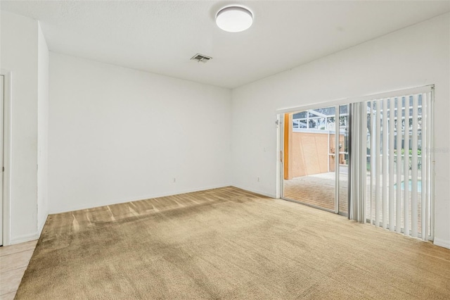 1713 Retreat Cir, Clermont, FL 34714 - unfurnished bedroom with carpet floors and access to exterior