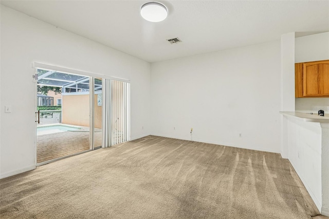 1713 Retreat Cir, Clermont, FL 34714 - unfurnished living room featuring carpet floors