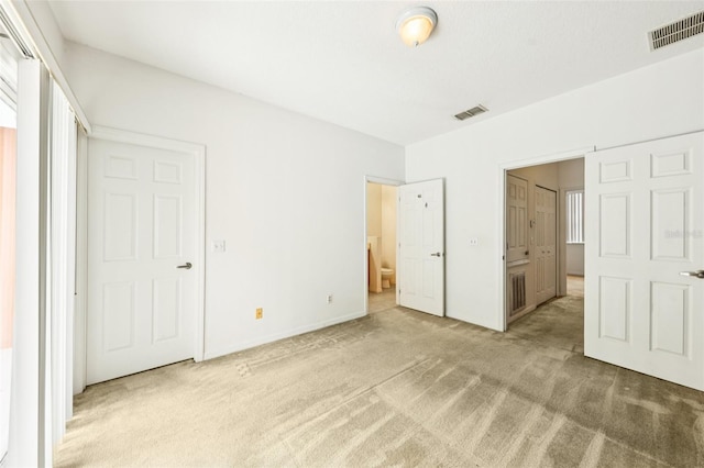 1713 Retreat Cir, Clermont, FL 34714 - unfurnished bedroom featuring carpet and ensuite bathroom