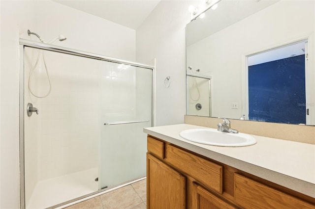 1713 Retreat Cir, Clermont, FL 34714 - bathroom featuring a stall shower, vanity, and tile patterned flooring