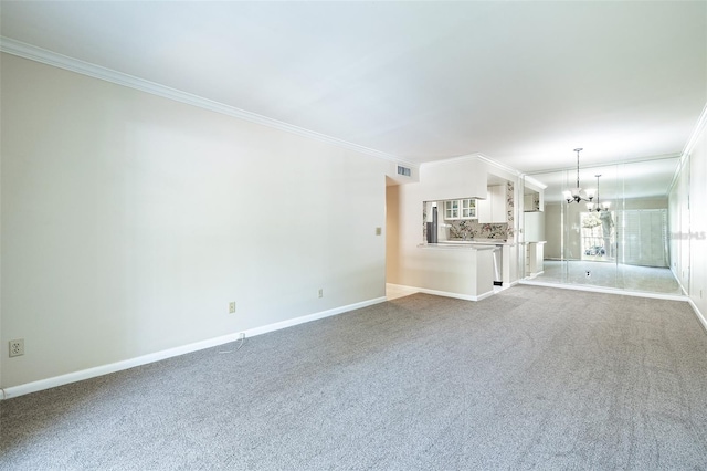 3325 Bayshore Blvd Unit A27, Tampa, FL 33629 - unfurnished living room featuring crown molding, a chandelier, and carpet floors