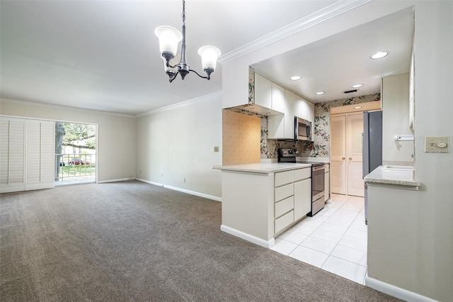 3325 Bayshore Blvd Unit A27, Tampa, FL 33629 - kitchen featuring stainless steel appliances, light countertops, ornamental molding, light carpet, and a chandelier