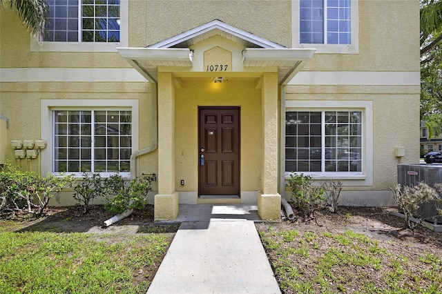 10737 Keys Gate Dr, Riverview, FL 33579 - property entrance with stucco siding