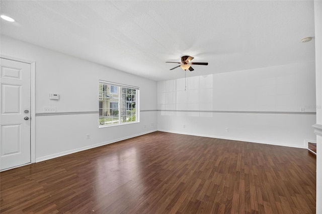 10737 Keys Gate Dr, Riverview, FL 33579 - spare room with a ceiling fan and dark wood-type flooring