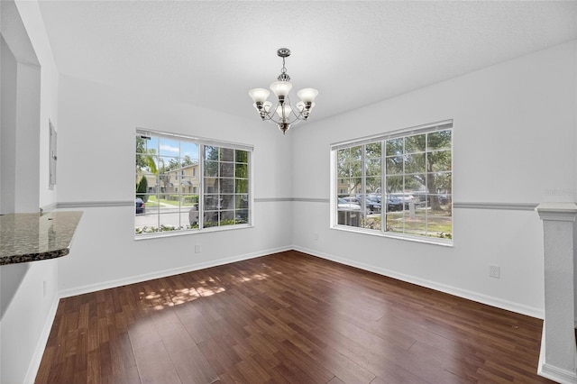 10737 Keys Gate Dr, Riverview, FL 33579 - unfurnished dining area featuring a chandelier and wood-type flooring