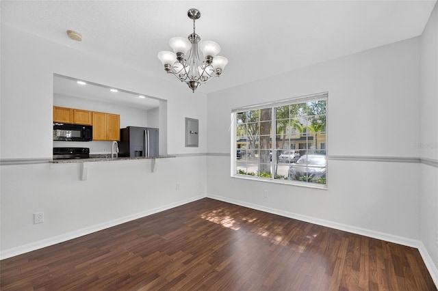 10737 Keys Gate Dr, Riverview, FL 33579 - unfurnished dining area featuring electric panel, dark wood-style flooring, a chandelier, and recessed lighting