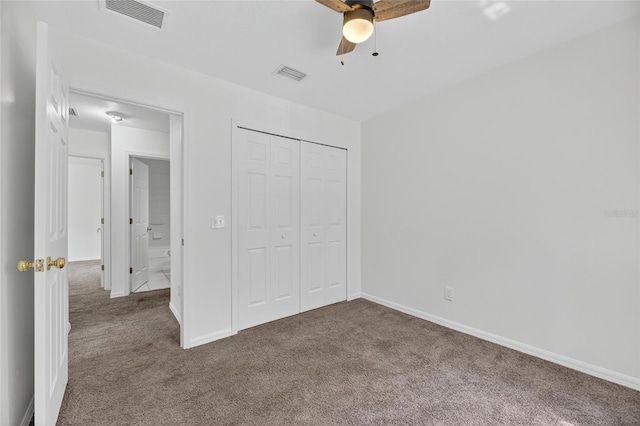 10737 Keys Gate Dr, Riverview, FL 33579 - unfurnished bedroom with carpet flooring, a closet, and a ceiling fan