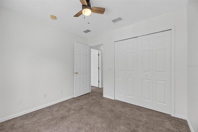 10737 Keys Gate Dr, Riverview, FL 33579 - unfurnished bedroom with carpet, a closet, and ceiling fan