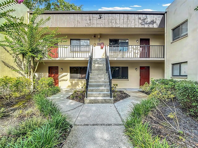 11718 Raintree Village Blvd Unit C, Temple Terrace, FL 33617 - view of building exterior with stairway